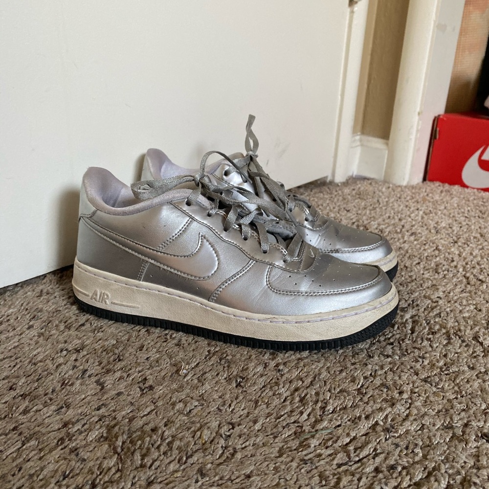 silver Nike airs